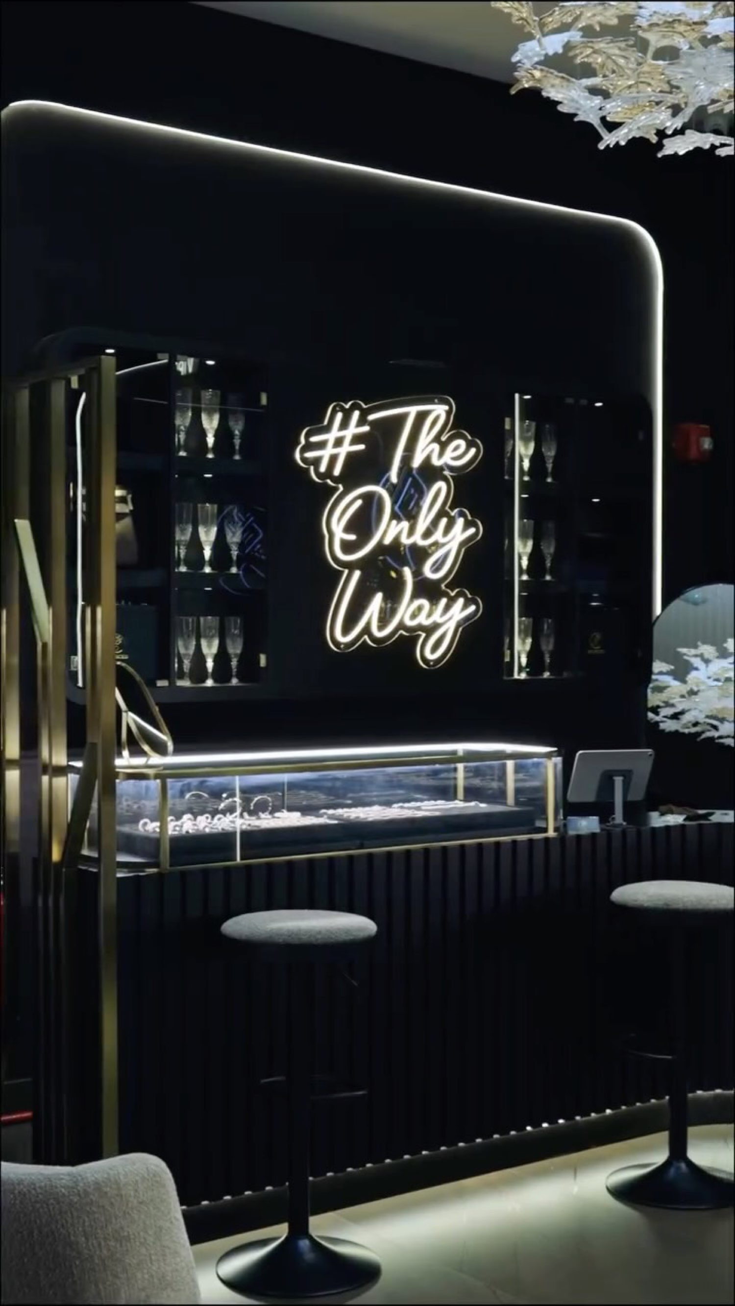 Inside Sourced Dubai, neon reading The Only Way