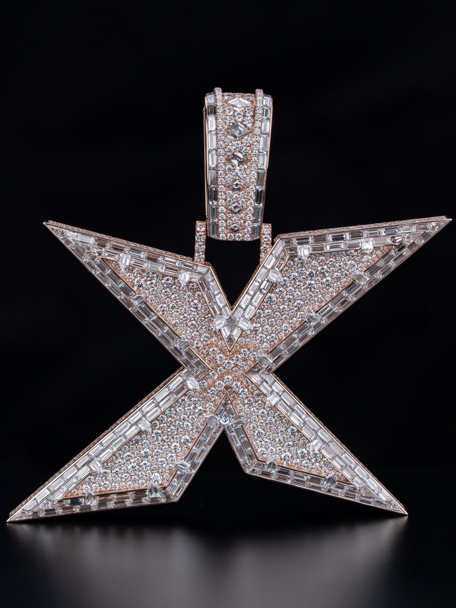 Emerald and diamond bullet-set pendant